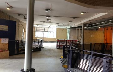 The upper foyer before during the reconstruction process