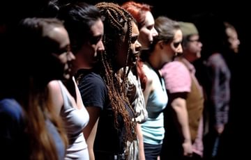 Young performers lined up on stage