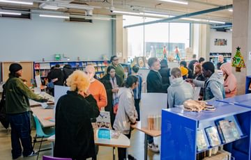 People explore a library
